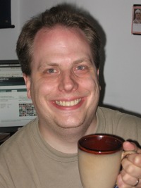 Craig, in front of an identi.ca screen, circa 2008